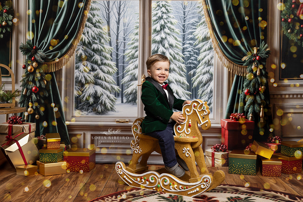Elegant Christmas window backdrop with green drapes, wreaths, snow-covered trees, and stacked presents for a festive photo setting.
