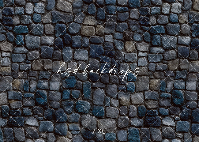 Dark gray and blue cobblestone floor backdrop for fantasy or castle-themed photoshoots.