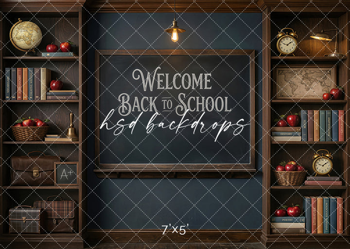 Welcome Back to School chalkboard photography backdrop with a vintage classroom chalkboard, wooden bookshelves, books, apples, globes, clocks, and nostalgic schoolroom details for portraits.