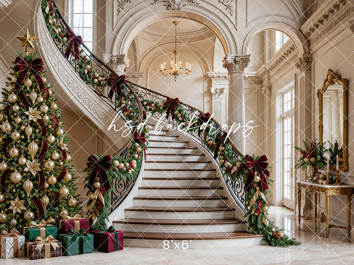 Gilded Christmas Staircase Photography Backdrop, flipped version, featuring a grand curved ivory staircase decorated with lush evergreen garlands, deep burgundy velvet bows, champagne-gold ornaments, gilded poinsettias, and a luxurious Christmas tree on the left, surrounded by classical columns, vaulted ceilings, a golden chandelier, and elegant European-inspired architecture.