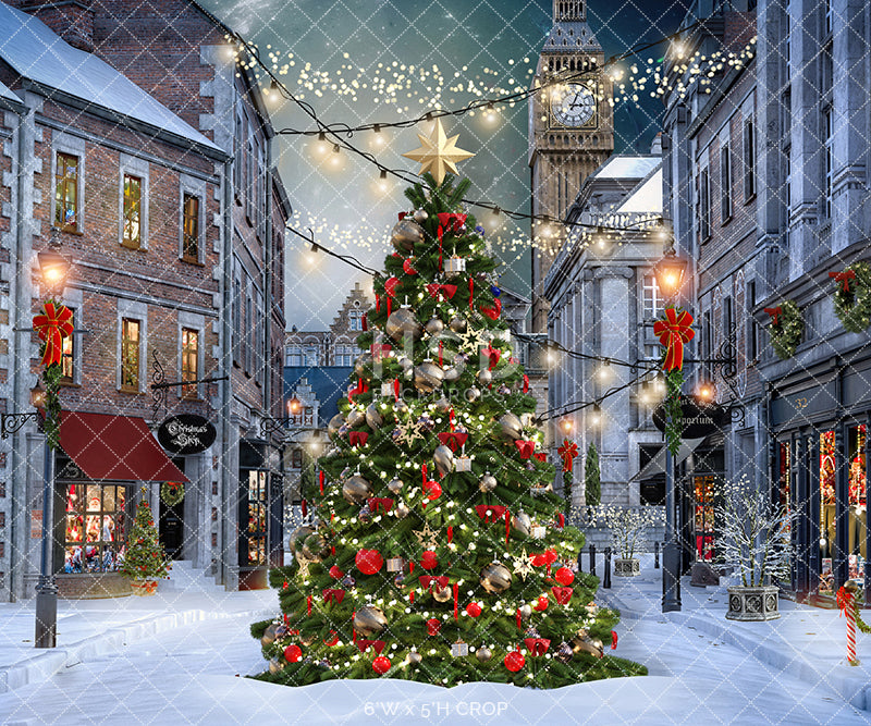 Christmas village photo backdrop with Christmas tree