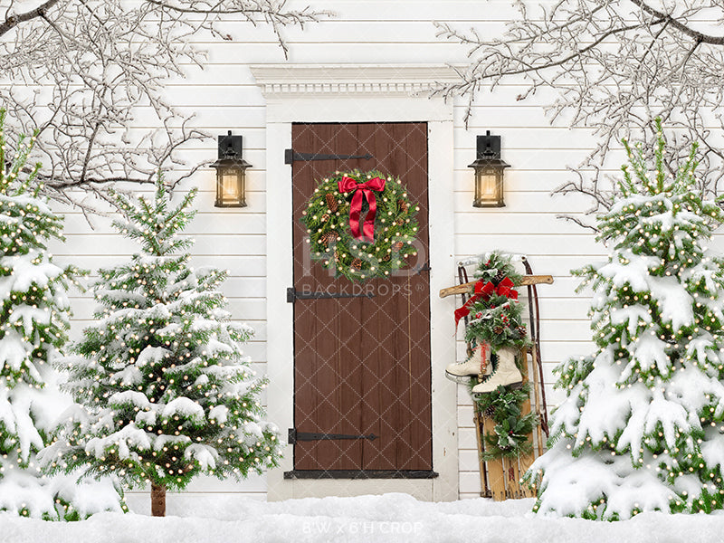Rustic Christmas barn door photo backdrop with snowy winter theme