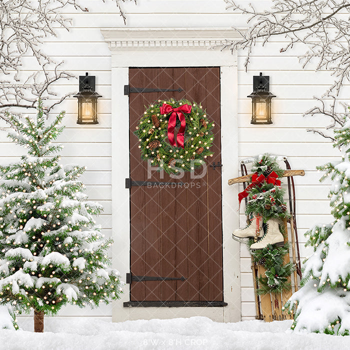 Rustic Christmas barn door photo backdrop with snowy winter theme