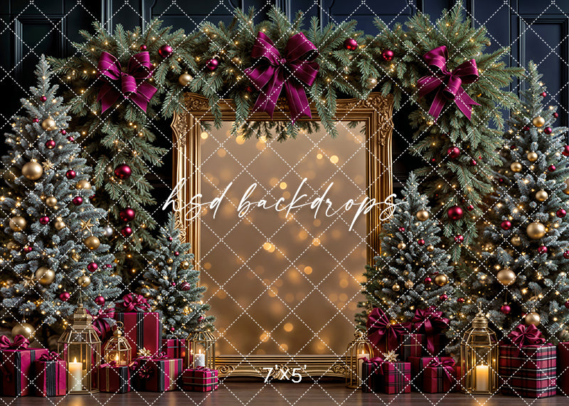 Christmas photo backdrop with mulberry bows, gold frame, lanterns, and trees decorated in rich holiday tones.