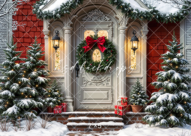 Snowy Victorian Christmas door with wreath, red house, holiday lights, and frosted pine trees – photography backdrop