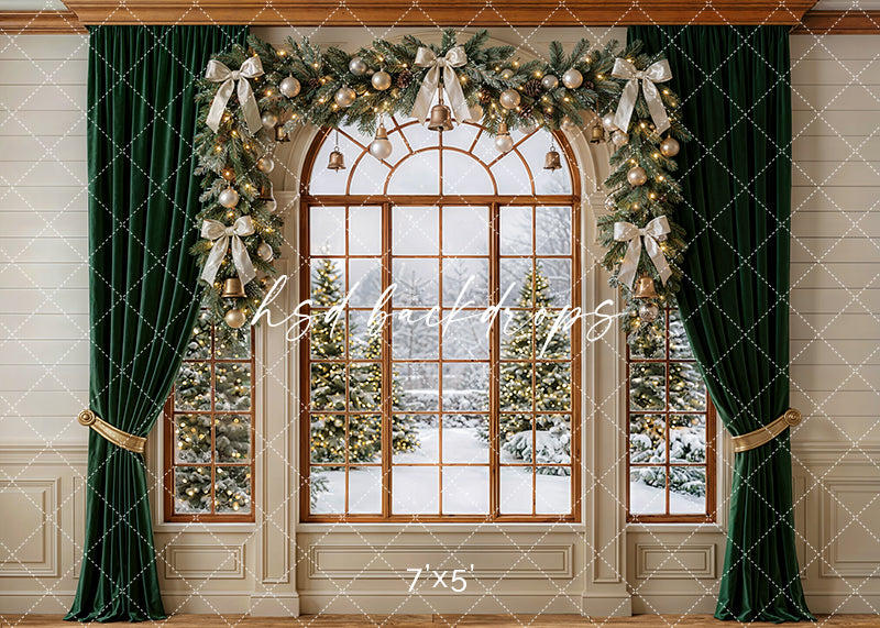 Grand Noel Window photography backdrop with an arched window, emerald curtains, festive garland, glowing ornaments, ribbon bows, and snowy Christmas trees for holiday portrait photography.