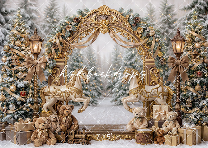 Snowy Carousel Arch photography backdrop with an ornate gold arch, carousel horses, snowy trees, lanterns, teddy bears, wrapped gifts, and festive holiday décor for portrait photography.