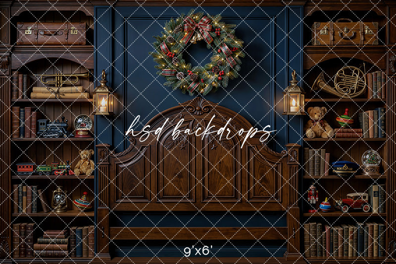 North Pole Express Headboard Photography Backdrop featuring a vintage Christmas bedroom scene with a wood train-inspired headboard, festive wreath, lanterns, bookshelves, toy trains, teddy bears, and luggage accents.