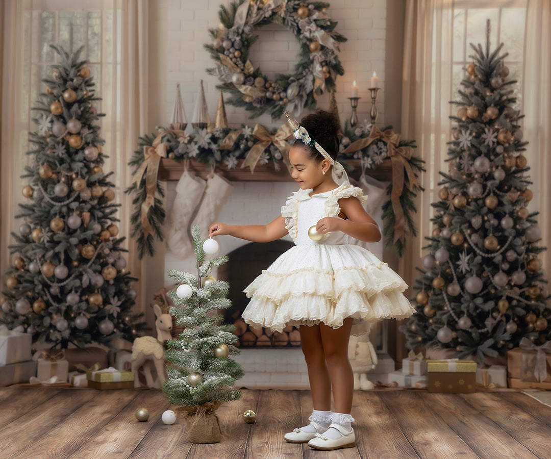 Ivory holiday fireplace portrait backdrop with soft neutral Christmas trees, cream stockings, gold ornaments, festive wreath, wrapped gifts, and cozy winter studio details.