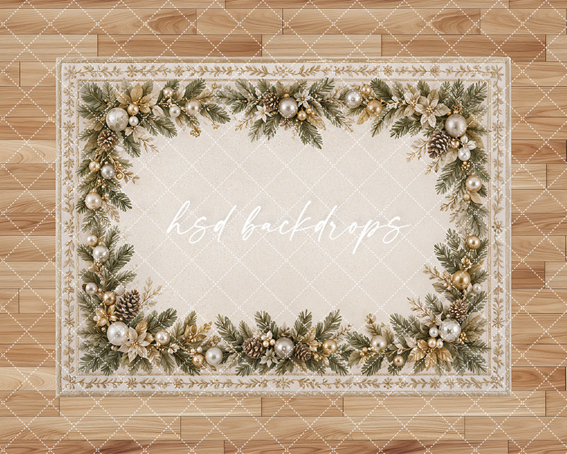 Golden Pine Garland photography floor backdrop with a rectangular ivory holiday rug design, pine branches, golden ornaments, festive greenery, and warm wood flooring.