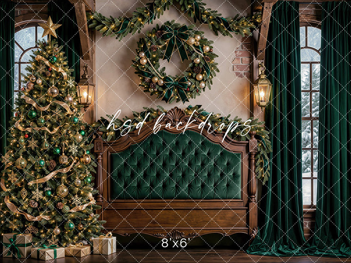 Evergreen Chateau Headboard photography backdrop with an emerald tufted headboard, decorated Christmas tree, festive wreath, glowing lanterns, and elegant holiday bedroom décor.