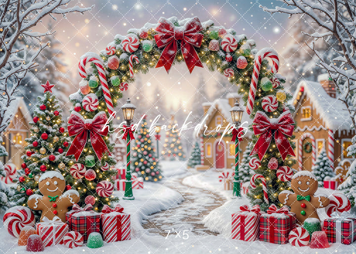 Peppermint Christmas arch photography backdrop with candy cane garland, gingerbread characters, wrapped gifts, snowy village path, glowing lights, and festive holiday decorations.