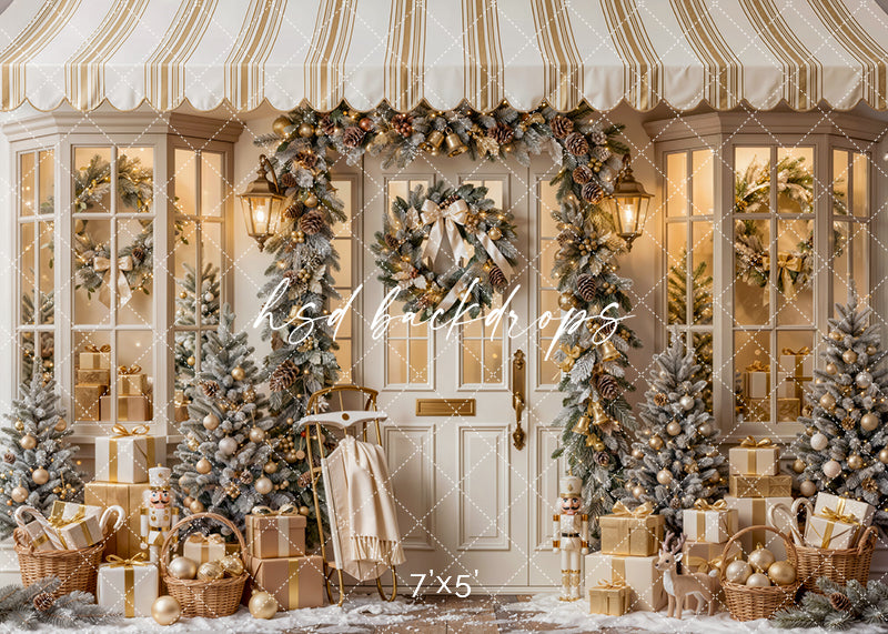 Winter Welcome Door Christmas photography backdrop with champagne and gold decorations, flocked Christmas trees, glowing lanterns, wrapped gifts, wreaths, and elegant holiday porch styling.