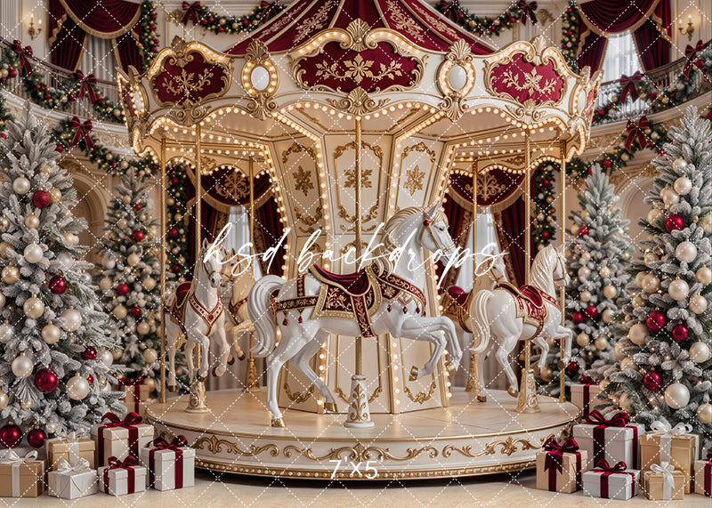 Holiday Carousel Dreams Christmas photography backdrop with ornate burgundy and cream carousel, white carousel horses, glowing lights, flocked Christmas trees, wrapped gifts, garland, and luxury holiday décor.