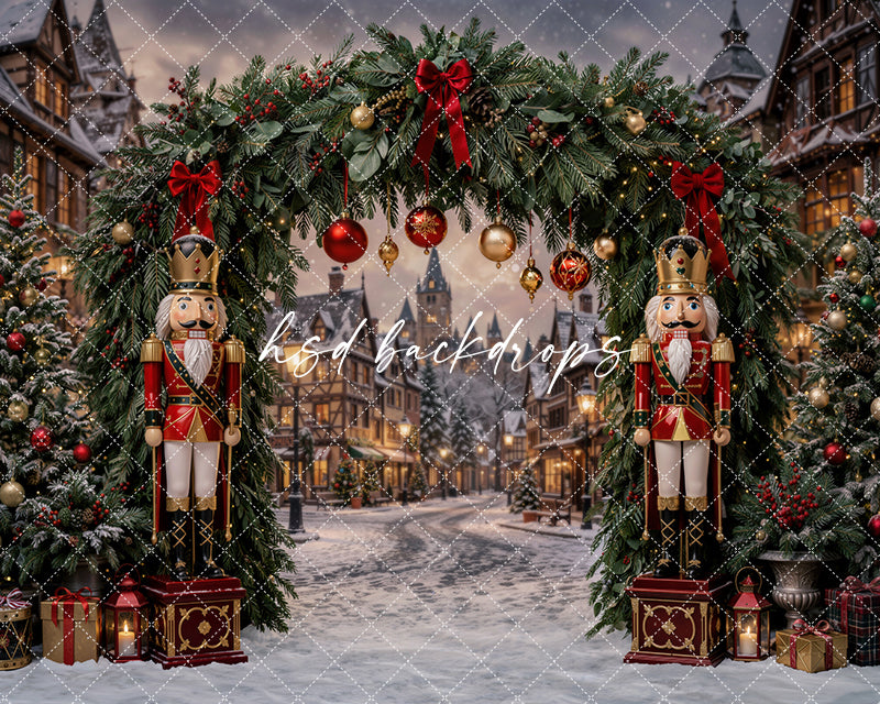Nutcracker Village Arch Christmas photography backdrop with evergreen arch, traditional nutcracker soldiers, hanging ornaments, red bows, snowy village street, lanterns, wrapped gifts, and festive holiday trees.