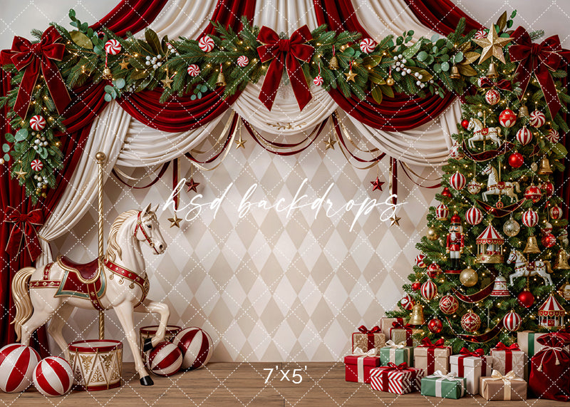 Peppermint Carousel Christmas photography backdrop with red velvet curtains, cream drapery, carousel horse, harlequin wall details, peppermint ornaments, evergreen garland, Christmas tree, wrapped gifts, and festive holiday studio styling.