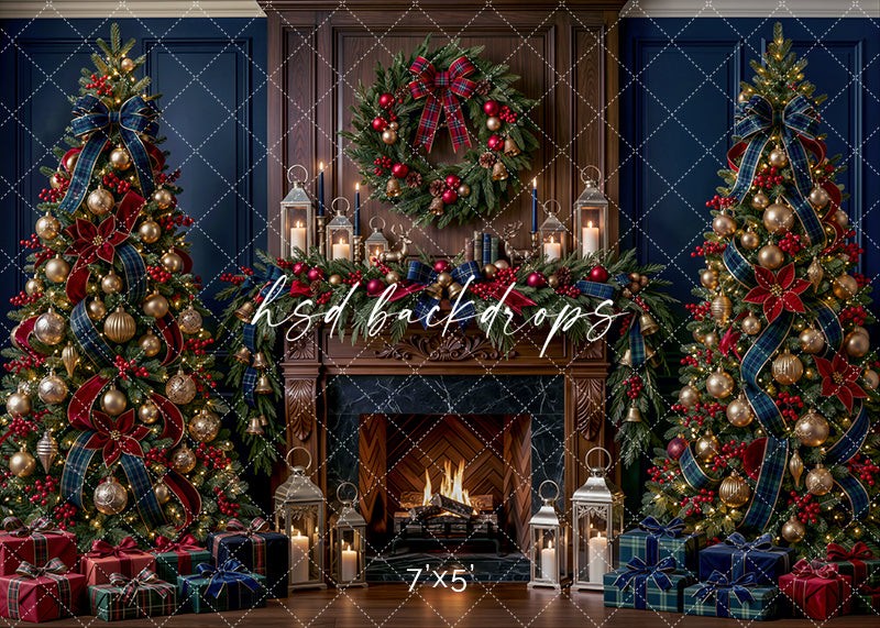 Navy Tartan Christmas Fireplace Photography Backdrop featuring a glowing fireplace, navy wall panels, decorated Christmas trees, festive garland, lanterns, wrapped gifts, gold ornaments, red poinsettias, and tartan ribbon accents.