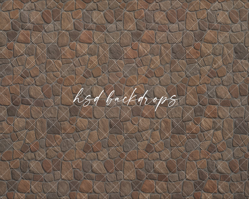 Natural cobblestone floor photography backdrop with gray and taupe stone pattern for portrait or studio photography.