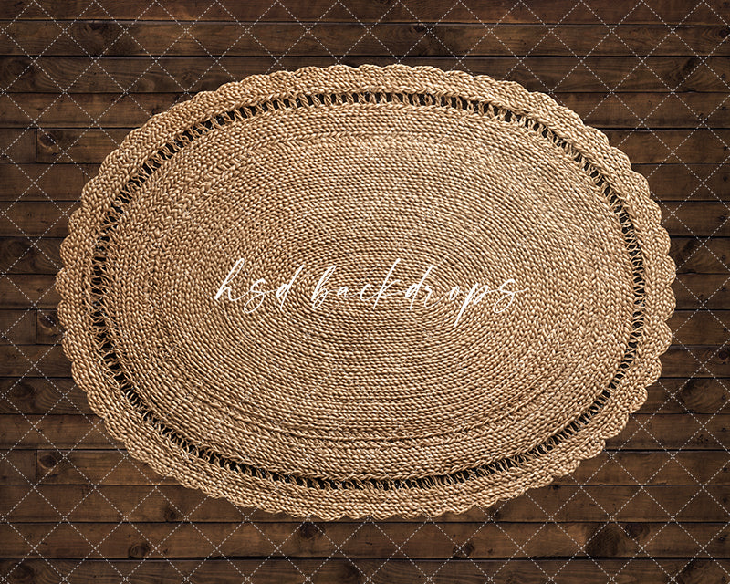 Jute oval rug on rustic dark wood floor photography backdrop with natural woven texture