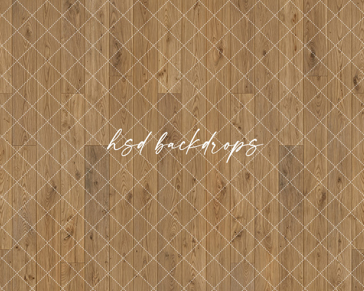 Warm oak wood plank studio floor photography backdrop with natural neutral wood texture for portrait sessions.