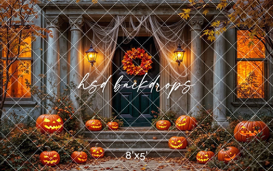 Halloween porch backdrop with glowing jack-o’-lanterns, autumn wreath, and fall leaves.