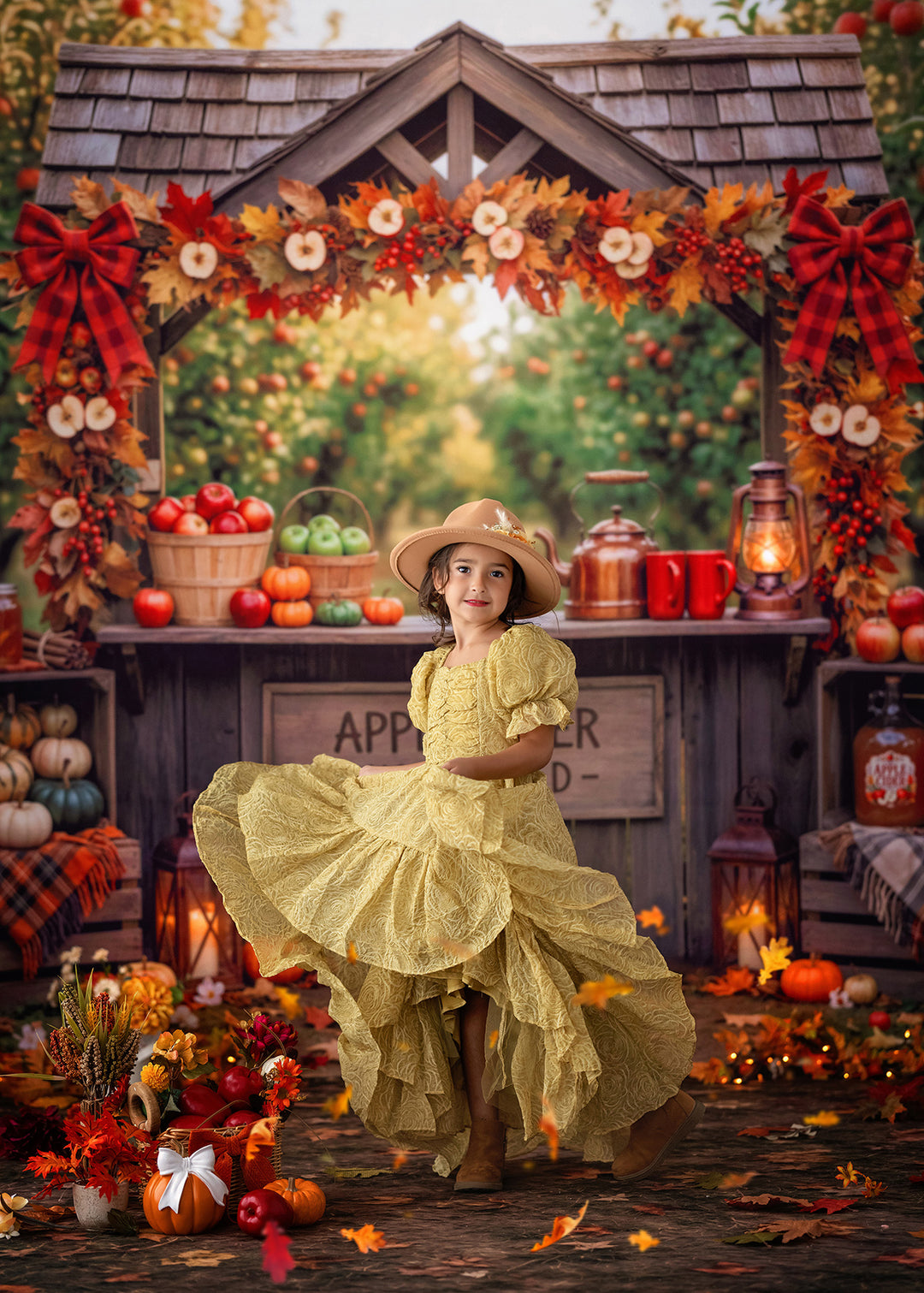 Fall apple cider market photography backdrop with apple baskets, pumpkins, lanterns, plaid blankets, rustic wooden stand, autumn foliage, and cozy harvest portrait styling.