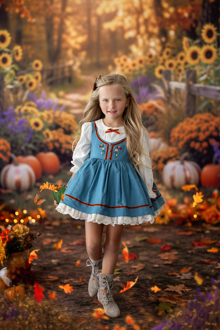 Pumpkin garden fall photography backdrop with sunflowers, pumpkins, rustic fence, autumn florals, falling leaves, and warm harvest path styling.