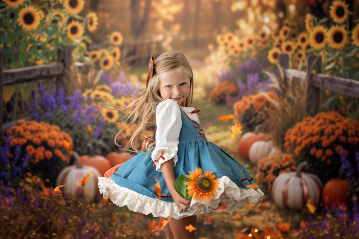 Golden autumn sunflower portrait backdrop with a cozy fall path, pumpkins, rustic fencing, orange flowers, purple blooms, and warm harvest light.