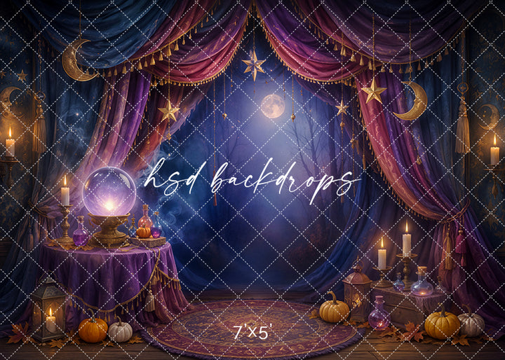 Mystic Fortune Teller photography backdrop with purple and blue drapery, celestial moons and stars, glowing candles, crystal ball, potion bottles, pumpkins, and enchanted Halloween décor.