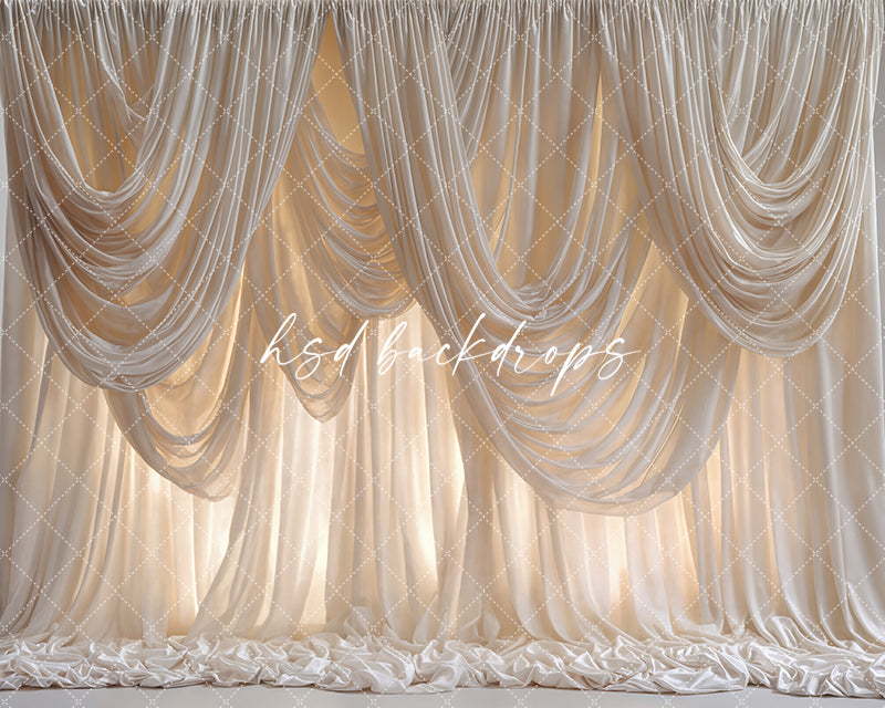 Ivory Elegance draped fabric photography backdrop with cascading cream curtains.