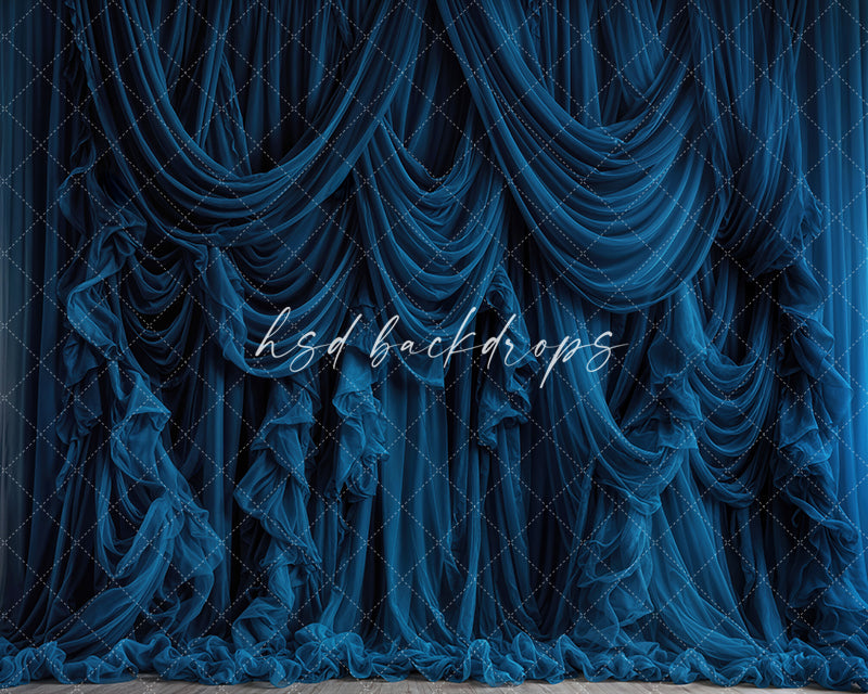 Navy blue draped fabric photography backdrop with elegant cascading curtains.