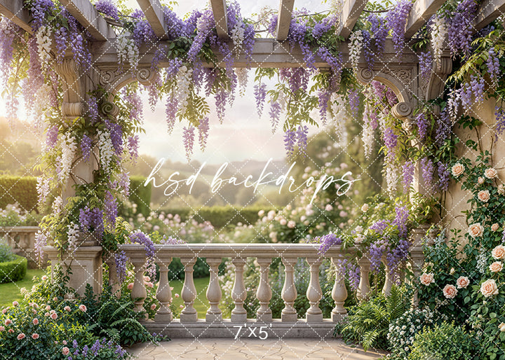 Romantic floral photography backdrop with wisteria vines draped over a stone pergola and garden view, perfect for spring, Mother’s Day, maternity, and quinceañera photos.