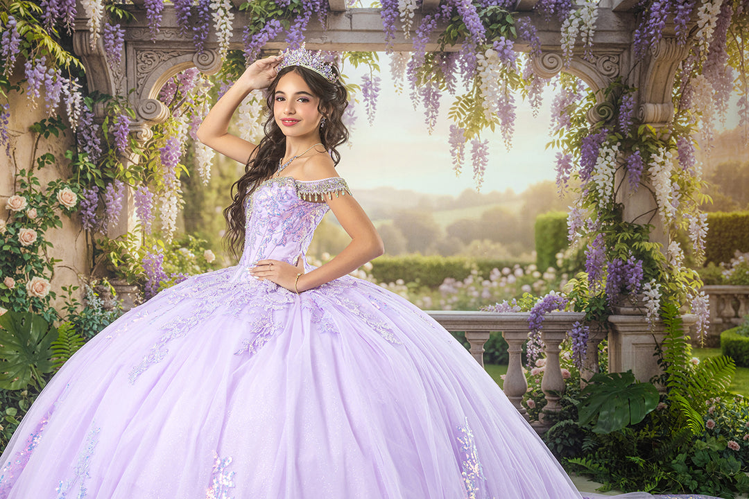 Enchanted wisteria pergola quinceañera backdrop with romantic hanging lavender flowers, classical stone columns, lush greenery, and a princess in a shimmering lavender gown.
