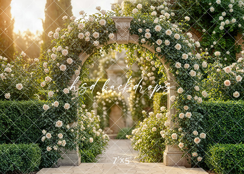 Ivory rose garden arch photography backdrop with sunlit stone archway, climbing roses, and lush greenery