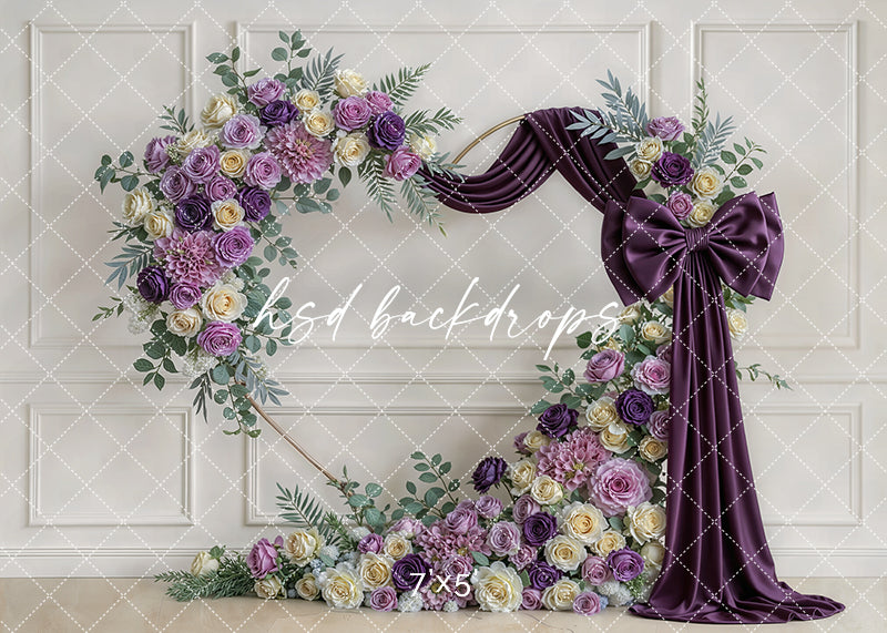 Plum purple rose bow floral arch photography backdrop with lavender florals and deep jewel tone drapery, elegant quinceañera and Sweet 16 portrait background.