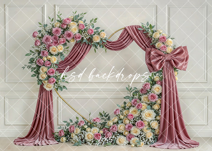 Blush rose bow floral arch photography backdrop with mauve drapery and gold circular frame, elegant pink portrait background for Valentine and Mother’s Day sessions.