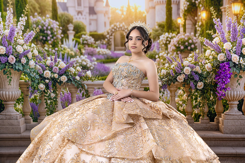 Romantic palace garden quinceañera photography backdrop with ornate stone terraces, cascading lavender and cream floral arrangements, and a quinceañera wearing a luxurious gold embroidered gown and tiara.