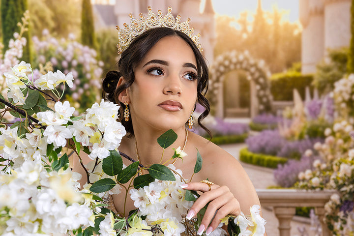 Fairytale castle garden quinceañera photography backdrop with grand stone architecture, romantic lavender flowers, ivory roses, golden sunlight, and a princess-inspired quinceañera portrait.