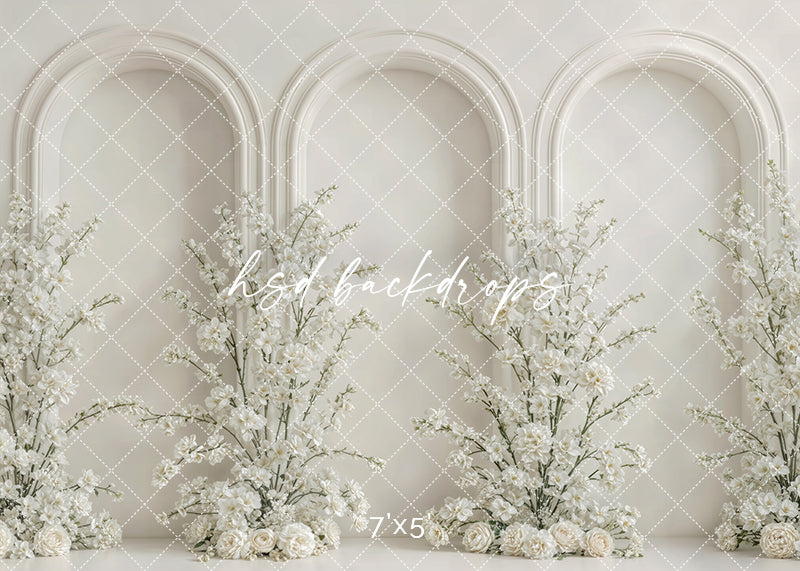 Ivory floral triple arch photography backdrop with elegant white flowers and architectural arches for Mother’s Day and maternity portrait photography.