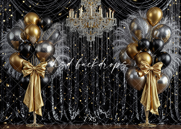 New Year’s Eve photography backdrop with black sequin drapes, gold and silver balloons, chandelier, and satin bows.