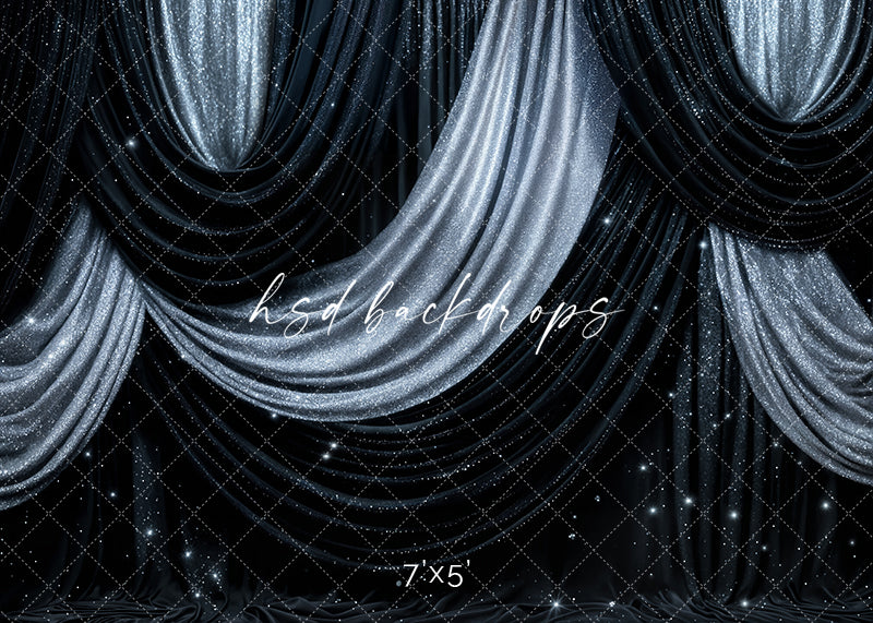 Black and silver glitter draped photography backdrop with shimmering stardust texture for New Year’s Eve portraits.