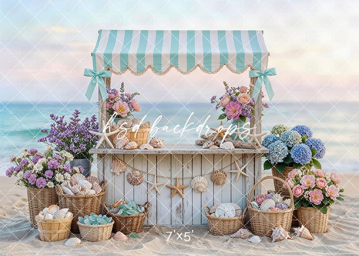 Seaside shell stand photography backdrop with seashells, starfish, coastal decor, and ocean background for summer portrait photography.