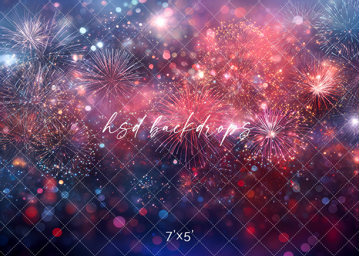 Patriotic fireworks bokeh photography backdrop with red white and blue fireworks and glowing light effects for Fourth of July portraits.
