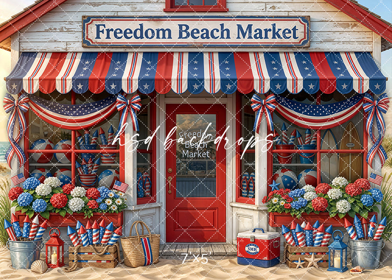 Freedom Beach Market photography backdrop with coastal storefront, patriotic decor, beach props, and red white and blue styling for Fourth of July portraits.