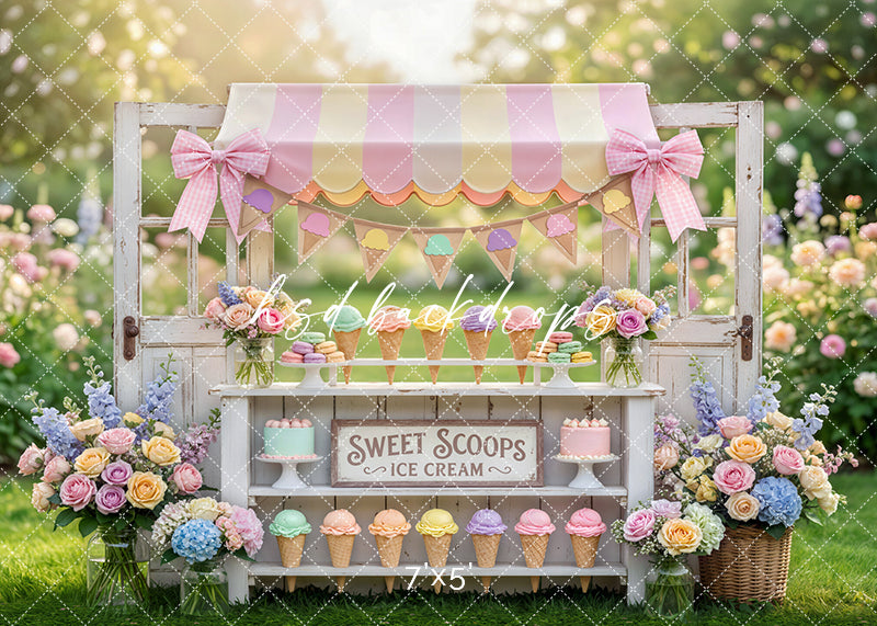 Pastel sweet scoops ice cream stand photography backdrop with floral arrangements, bows, and colorful ice cream cones for cake smash portraits.