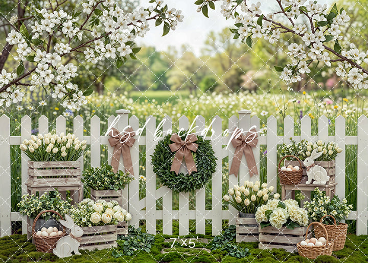 Spring Easter backdrop with white picket fence, tulips, blooming branches, crates, eggs, and bunny décor
