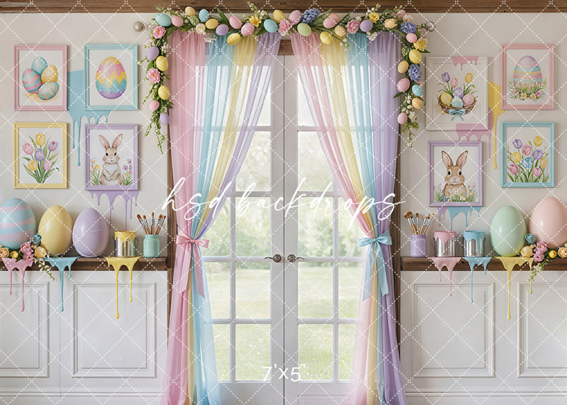 Pastel Easter window backdrop with rainbow curtains, bunny artwork, painted eggs, spring florals, and watercolor art studio décor.