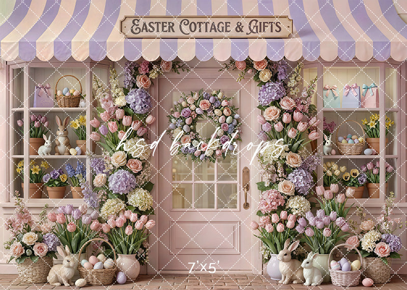 Blush and lavender Easter cottage storefront with pastel florals, tulips, hydrangeas, bunnies, and decorative eggs in a spring photography scene.