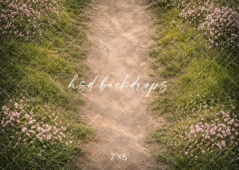 Spring blossom meadow path photography floor mat with dirt pathway and pink wildflowers for garden portrait sessions.