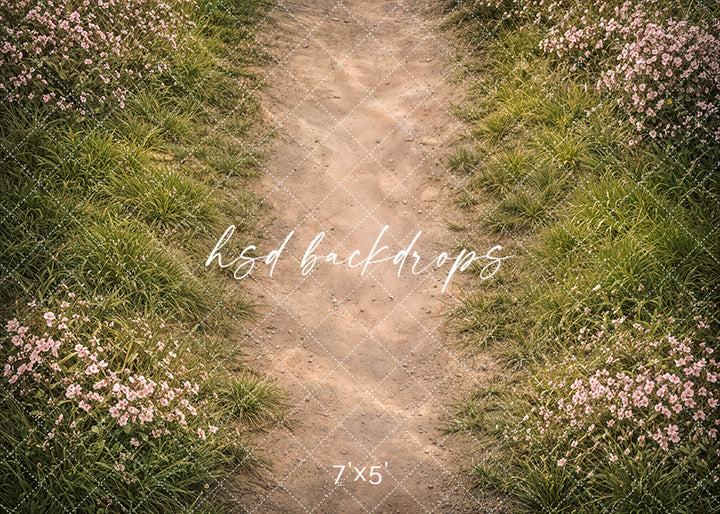 Spring blossom meadow path photography floor mat with dirt pathway and pink wildflowers for garden portrait sessions.